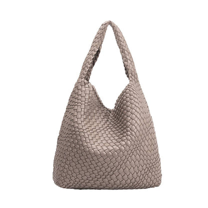 Woven handbag on a white background