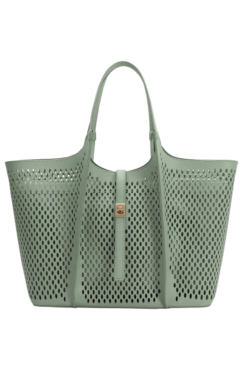Mint green perforated handbag on a white background