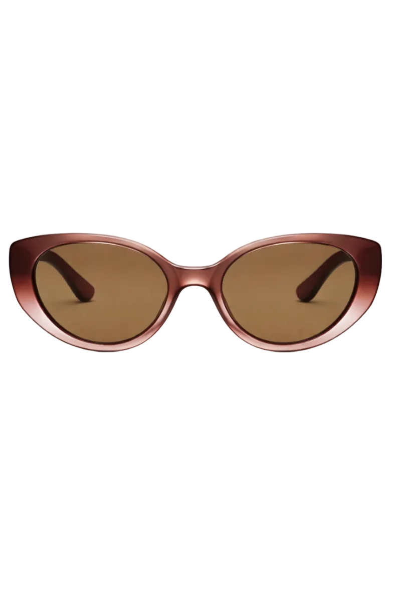 Oval sunglasses with a translucent reddish-brown frame and brown tinted lenses, shown against a plain white background.