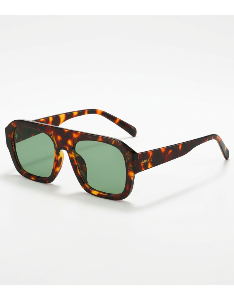 Sunglasses with tortoiseshell frame and green lenses on a white background