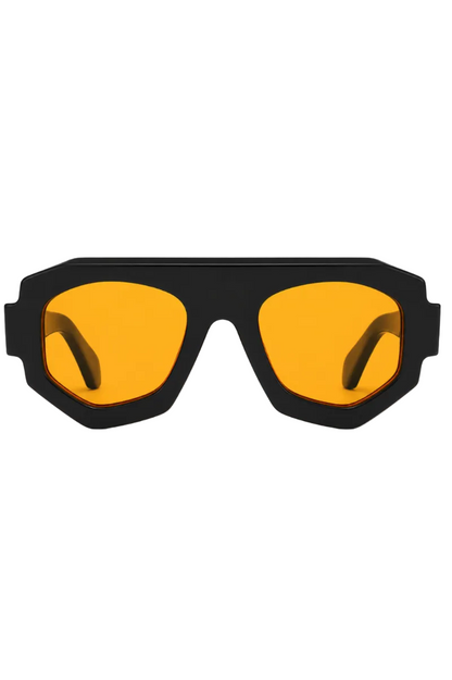 A pair of oversized shield-style sunglasses with a matte black frame and vibrant orange-yellow lenses, shown against a plain white background.