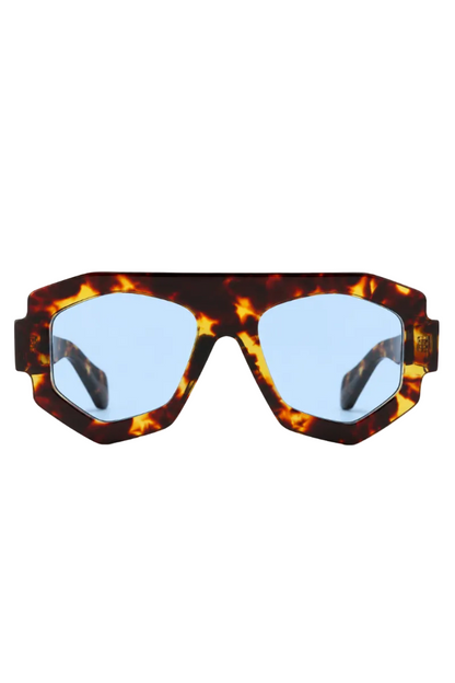 Sunglasses with tortoiseshell frame and blue lenses on a white background