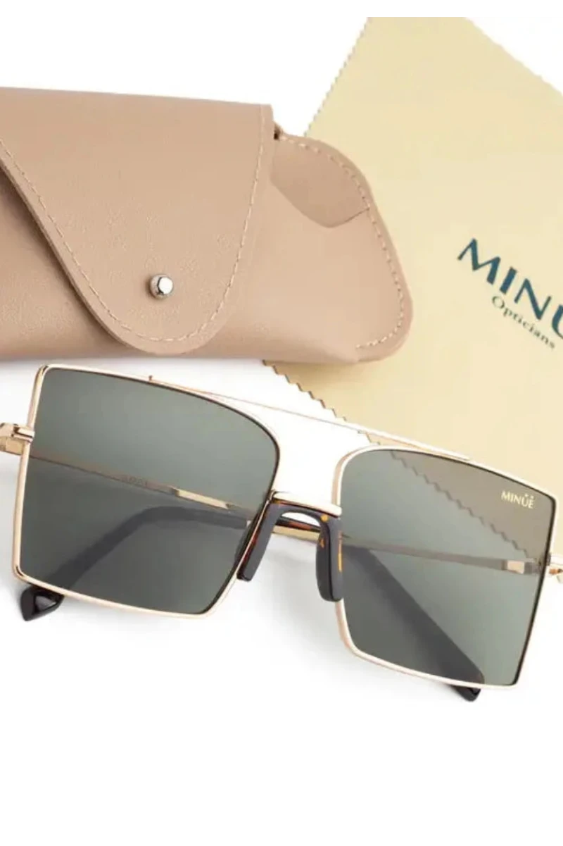 Square metal-frame sunglasses with dark tinted lenses, shown with a beige leather case and a branded MINÚE Opticians cloth on a white background.