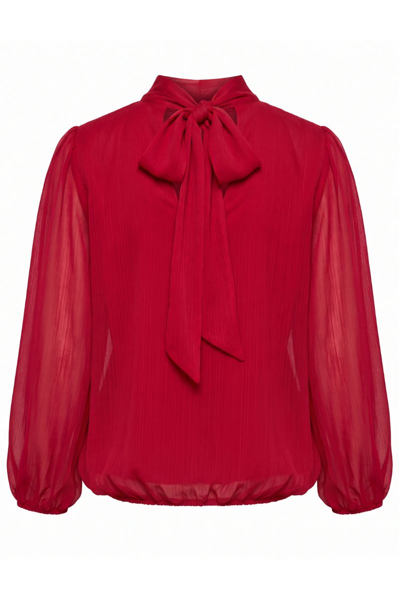 A vibrant red long-sleeve blouse made of pleated, semi-sheer chiffon-like fabric, featuring a high collar with a large bow at the neck and gathered sleeves.