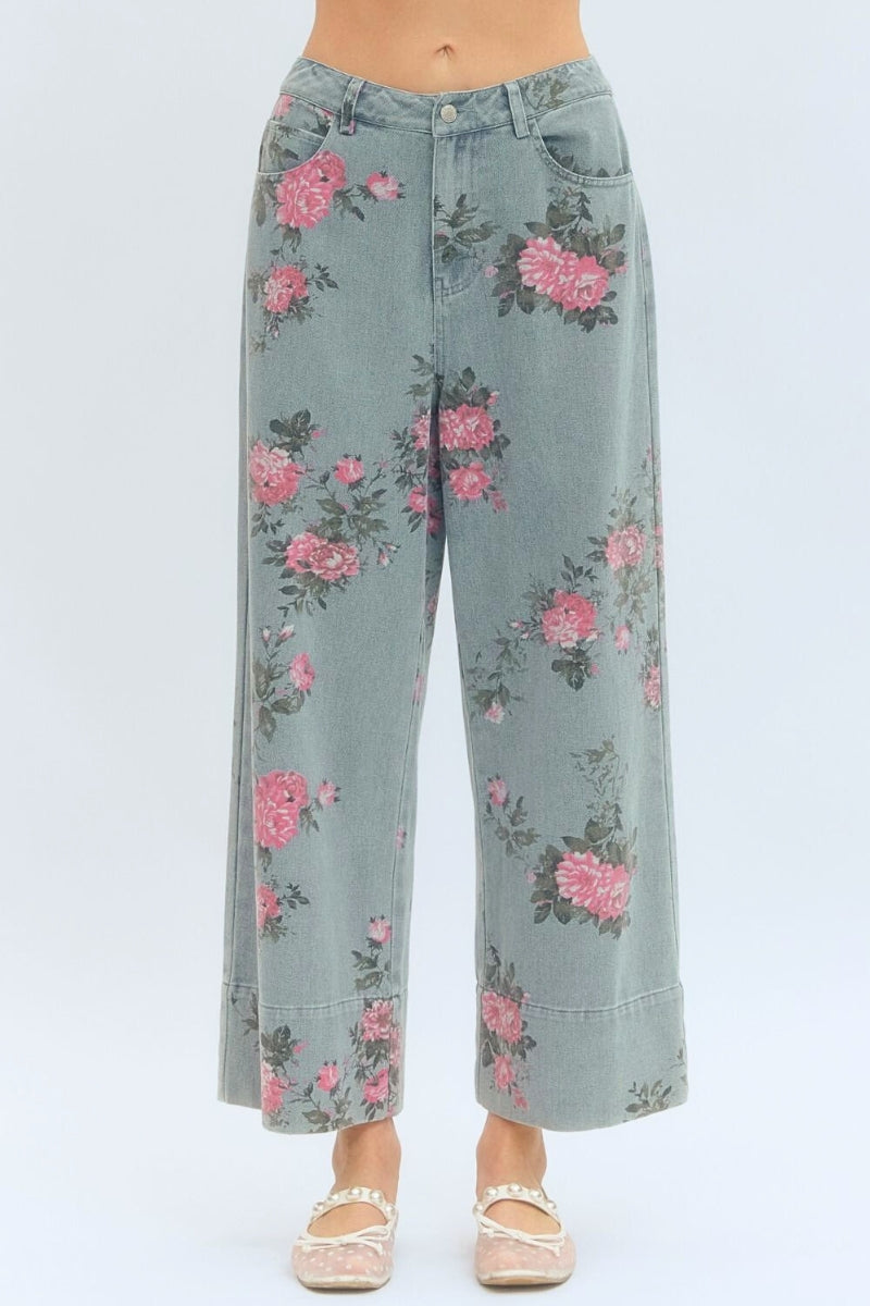 Floral-patterned jeans on a white background