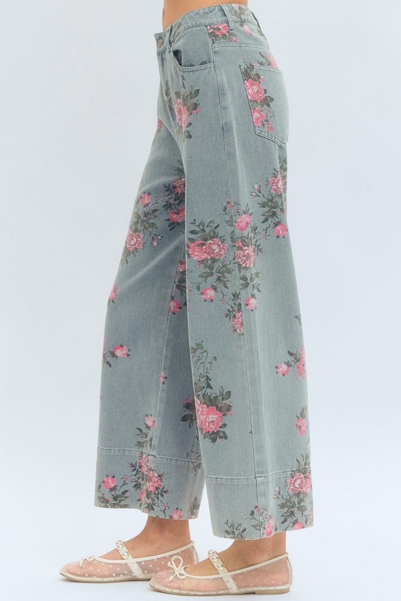 Floral patterned pants on a plain background