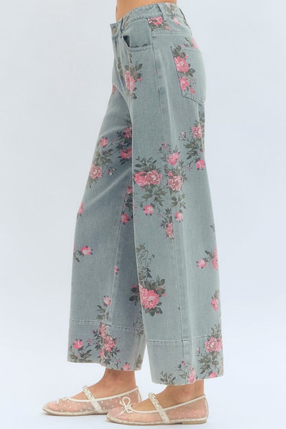 Floral patterned pants on a plain background
