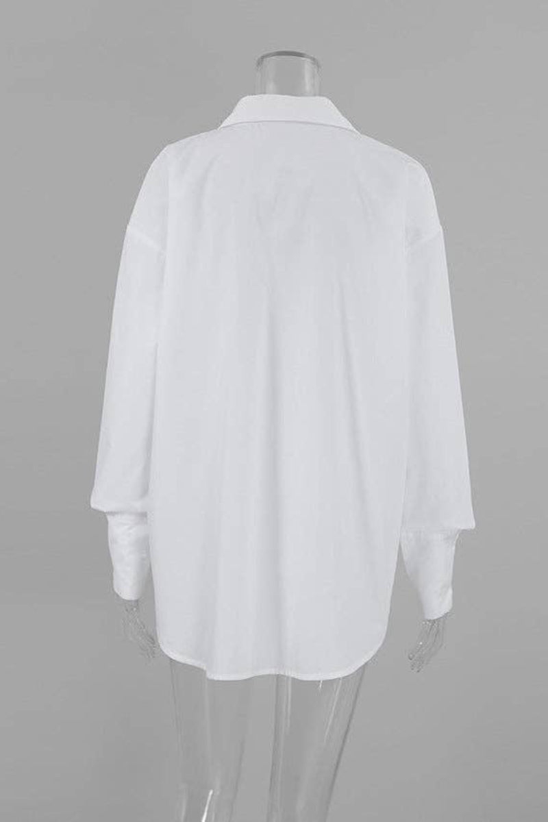 White shirt on a mannequin against a gray background