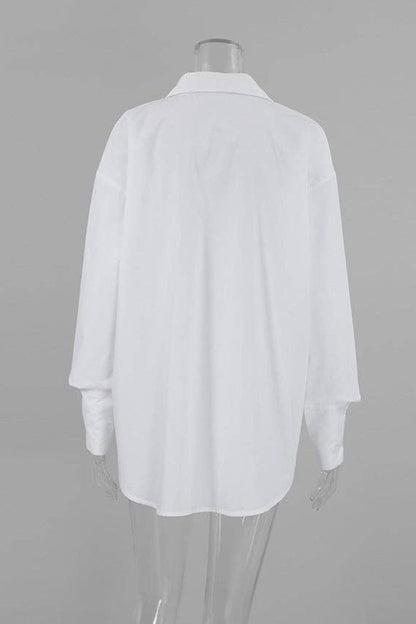White shirt on a mannequin against a gray background