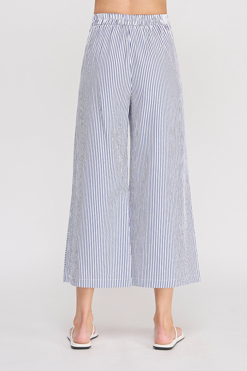 Blue and white striped wide-leg pants on a plain background