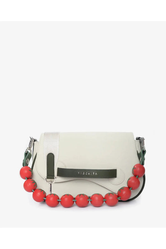 Parchita Brand handbag with tomato shade bead handle on a white background