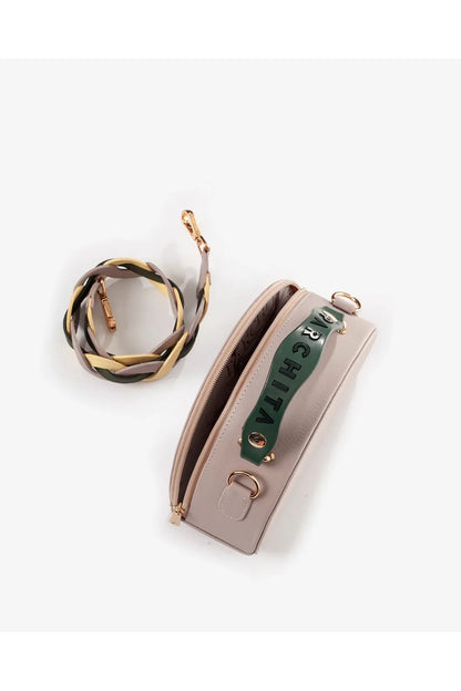 Parchita Brand handbag with a green strap on a white background