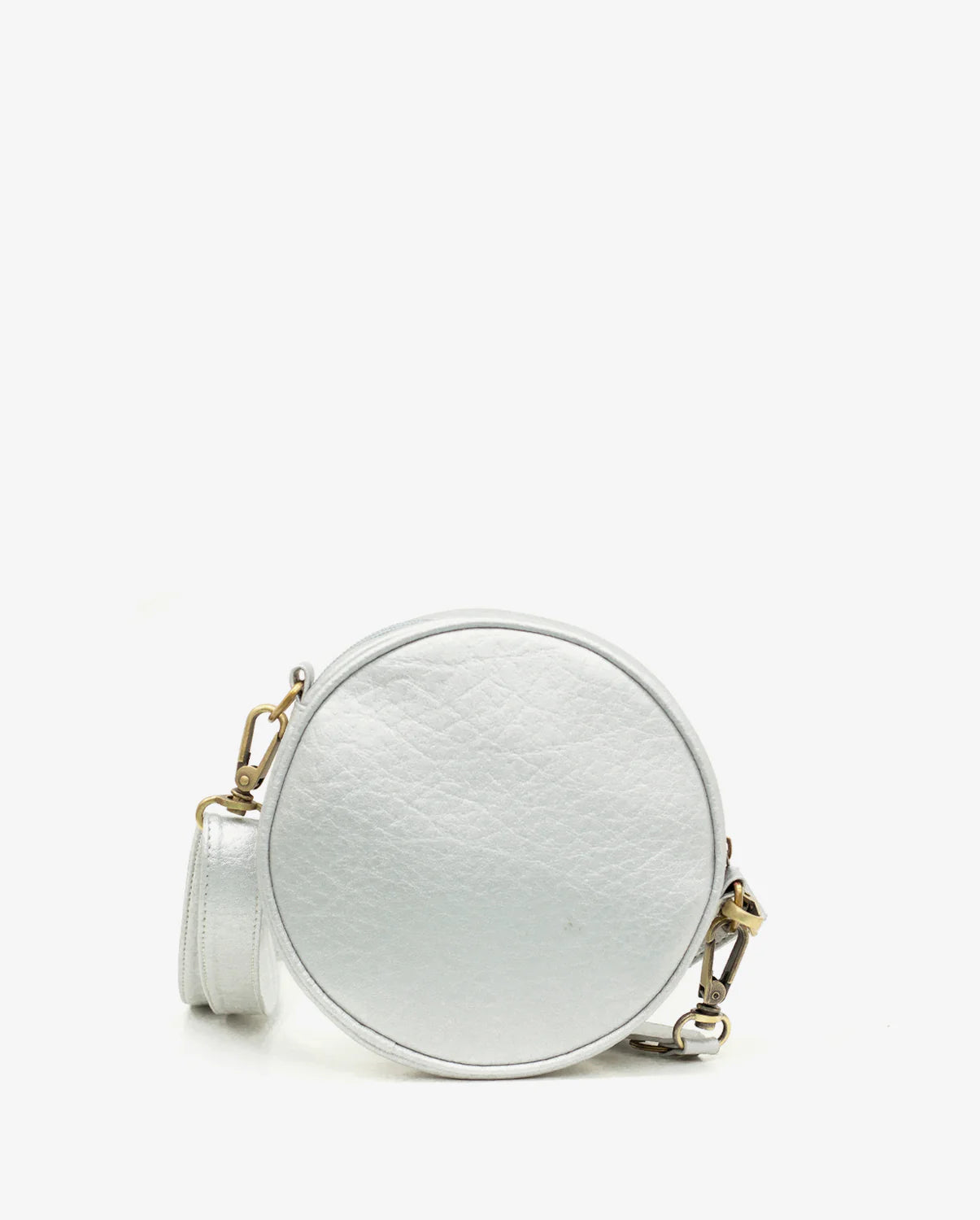 Round white handbag with gold accents on a white background
