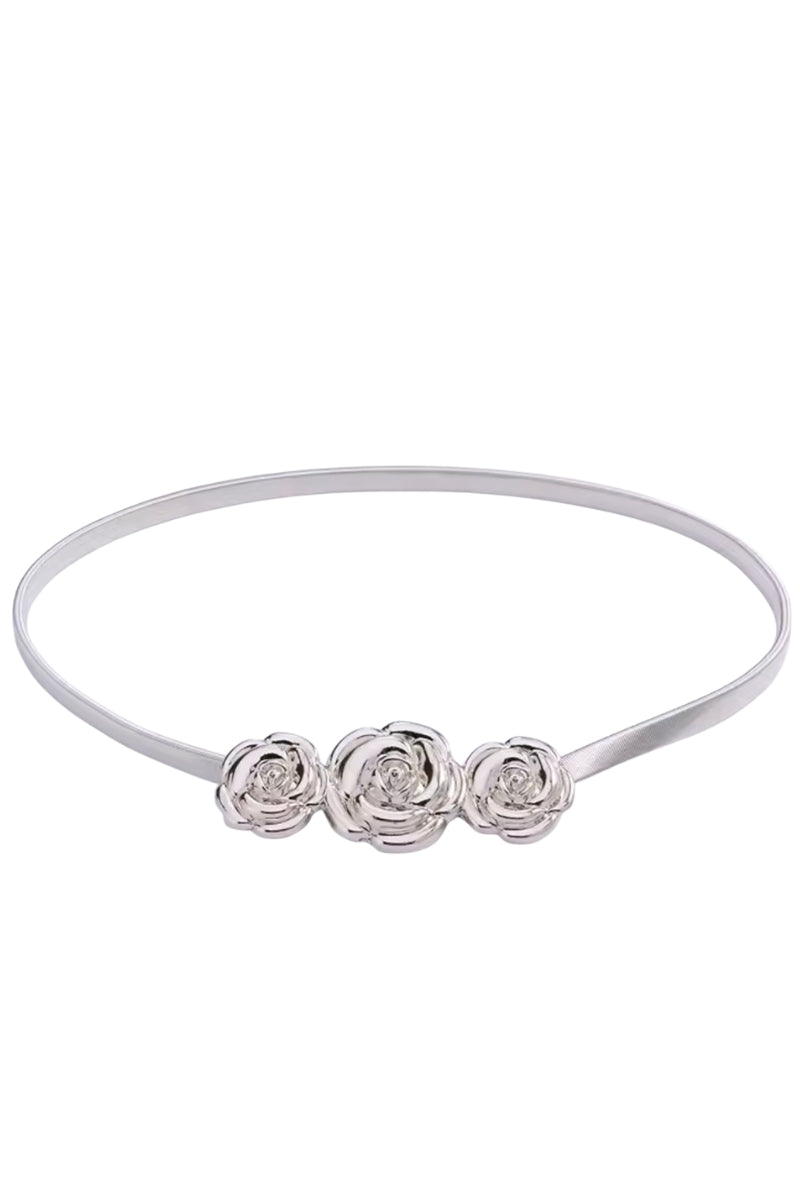 White headband with three floral designs on a white background