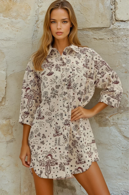 Woman wearing a patterned dress against a stone wall