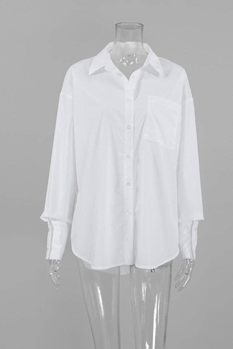 White shirt on a mannequin against a gray background