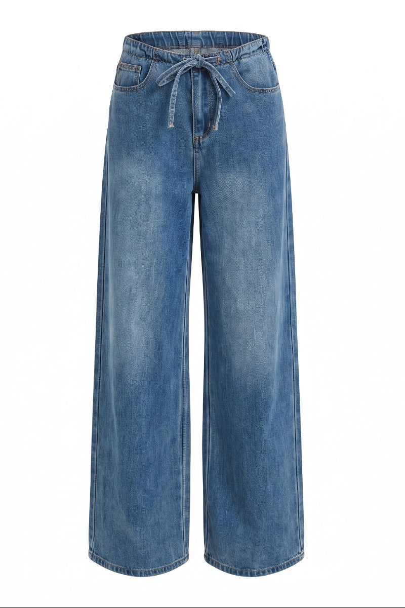 A pair of wide-leg blue denim jeans with a drawstring waistband, displayed on a clean white background.
