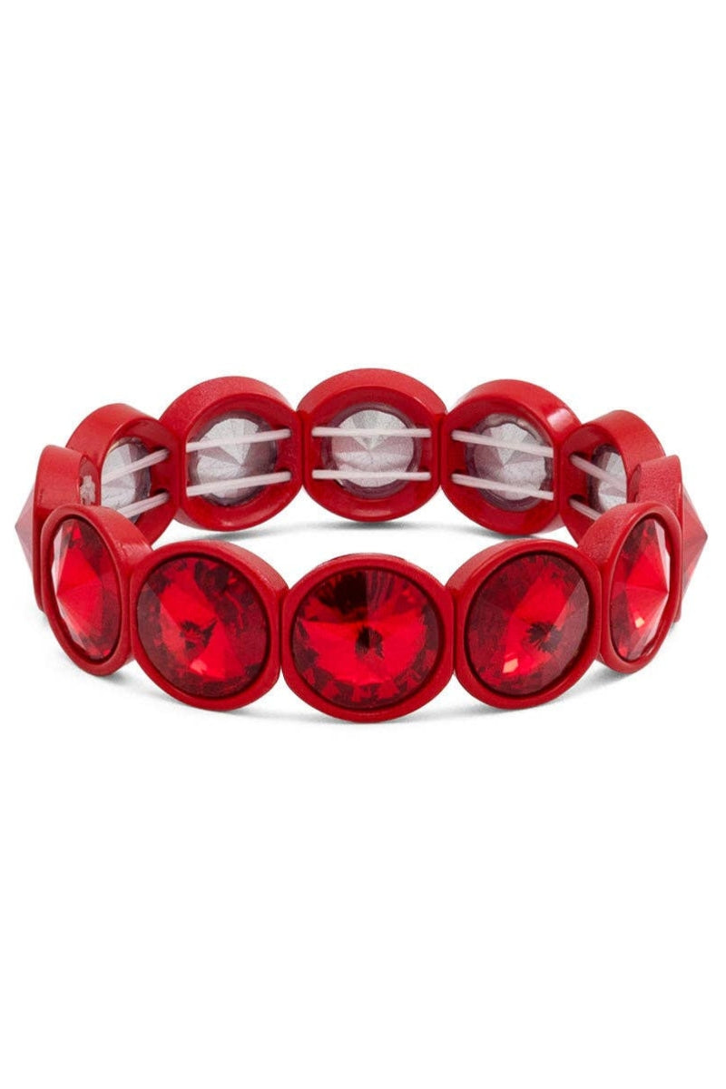 Red bracelet with circular red stones on a white background