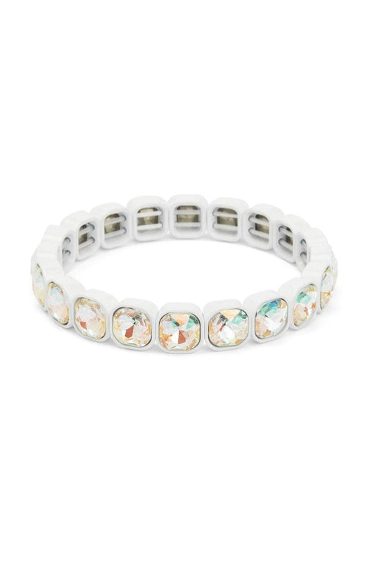 White bracelet with multicolored gemstones on a white background