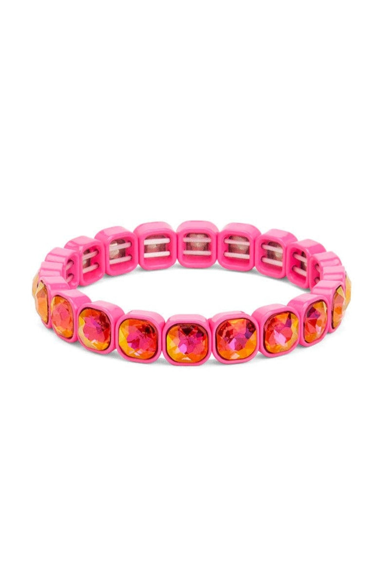 Pink bracelet with orange gemstones on a white background