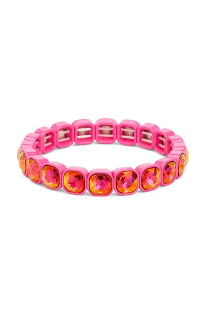 Pink bracelet with orange gemstones on a white background