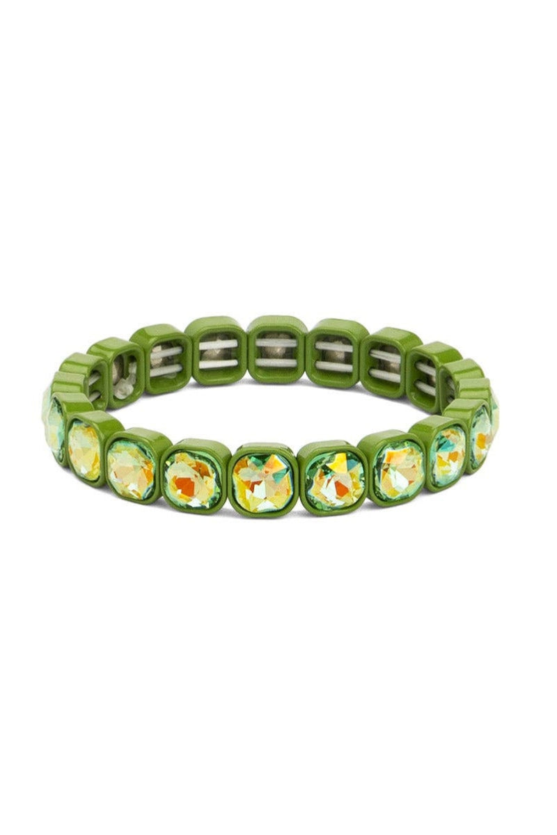 Green beaded bracelet with floral patterns on a white background