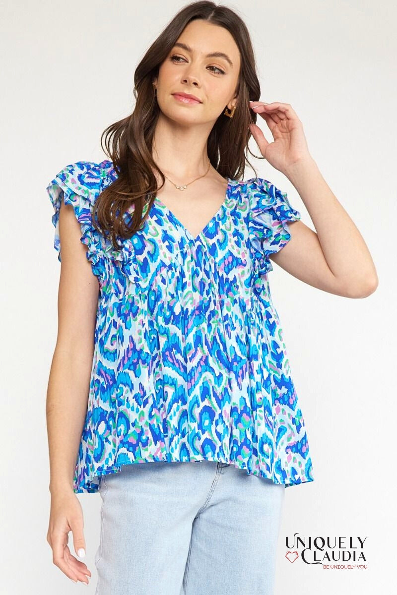 Woman wearing flutter sleeves top