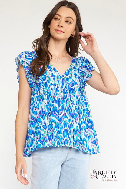 Woman wearing flutter sleeves top